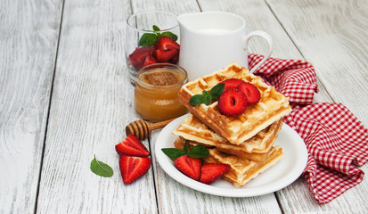 belgian waffles with strawberries and mint