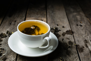 Green tea in white cup