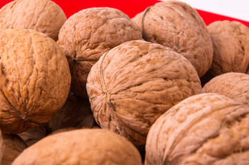 walnuts in red plate