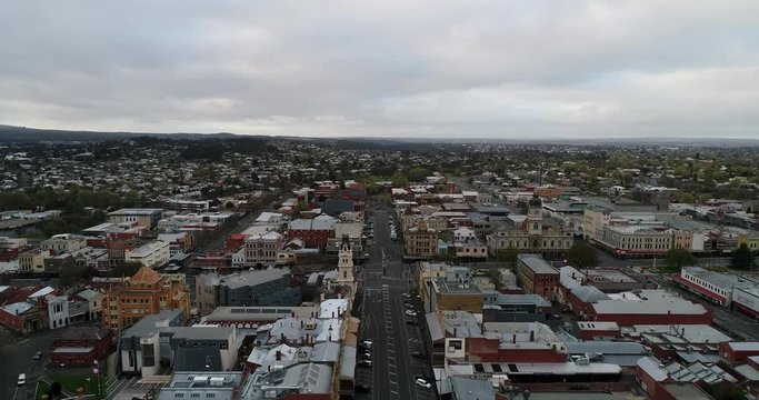 Ballarat downtown from above with historic buildings of Town hall, gallery, banks and central streets in aerial view.
