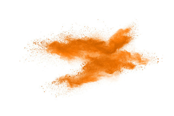 Freeze motion of orange powder explosions isolated on white background