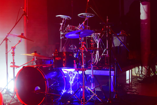 Drums on the stage, illuminated