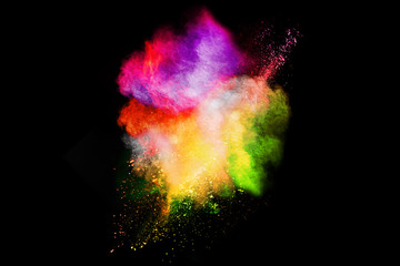 Obraz na płótnie Canvas Splash of colorful powder over black background.Splash of colorful powder over black background.
