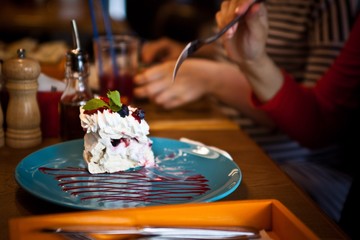 cream dessert with berries on a plate