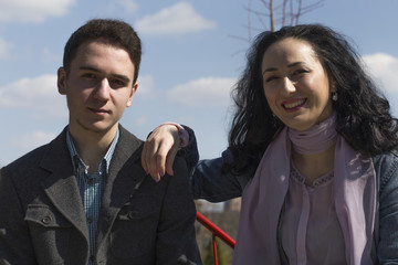 Mother and son are together.