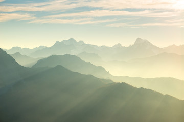 The Alps in soft backlight. Toned mountain range of the Massif des Ecrins National Park, France,...