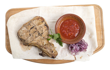 Chicken steak with tomato sauce.