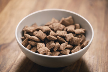 chcolate cereal pillow in white bowl on table