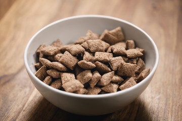 chcolate cereal pillow in white bowl on table