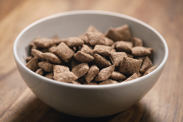 chcolate cereal pillow in white bowl on table