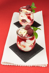 layered dessert with raspberry, cream cheese and white chocolate