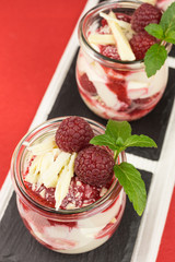 layered dessert with raspberry, cream cheese and white chocolate