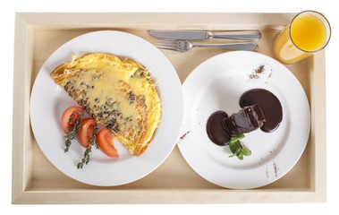 Omelet with dessert and juice.