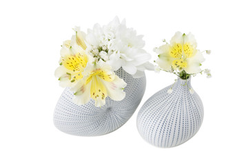 Decorative vases with flowers.