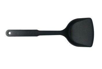 Black plastic spade of frying pan isolated on white background. For kitchen.