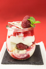 layered dessert with raspberry, cream cheese and white chocolate