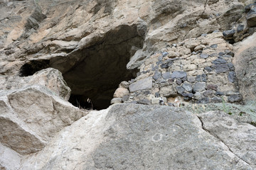 Cave monastery coverd in rock, Vardzia, Georgia 