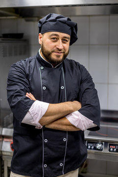 Chef in the kitchen.black uniform 