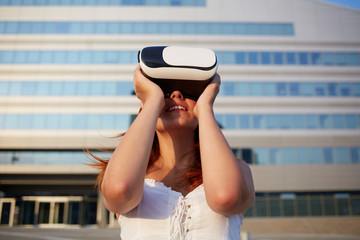 young woman using viewer for augmented reality