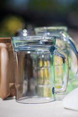 Inverted clean washed glasses and mugs for beer.