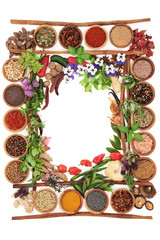 Fototapeta na wymiar Herb and spice abstract background border with fresh and dried herbs and spices and cinnamon sticks creating a frame Top view with copy space. 