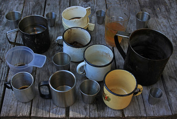 Metal and plastic mugs and glasses