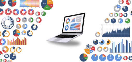 ノートパソコンとビジネス資料