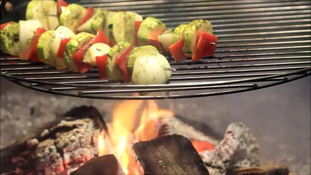 vegetables on hanging grill, bbq, fire
