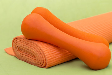 dumbbells on a sport mat