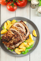 Roasted pork roll stuffed with other meat