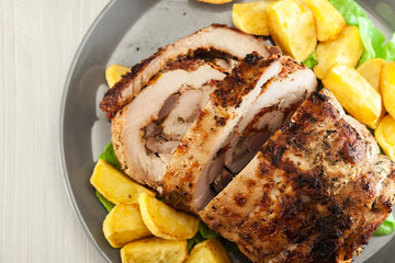 Roasted pork roll stuffed with other meat