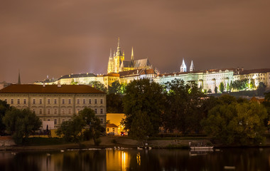 Fototapeta na wymiar Prague Castle in Prague, Czech Republic. Embankment of the Vltava River
