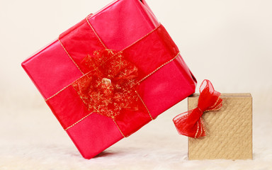 Two gift boxes red and golden