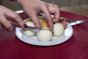boiled eggs, dough and sausages