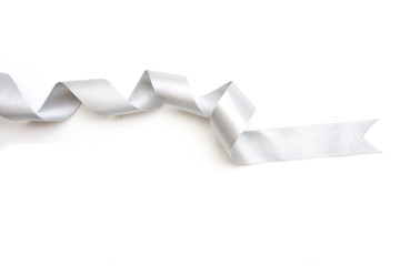 silver ribbon bow in bright silver white grey color isolated