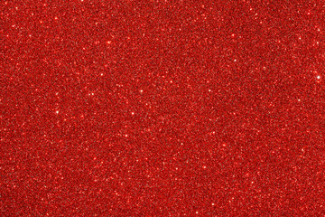 Red (ruby) glitter background. Sparkle texture. Abstract background for New Years or Christmas...