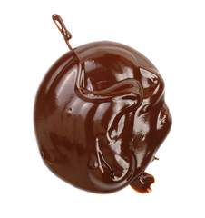 Hot melted chocolate pouring isolated on white background, top view