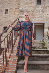San Leo (Forli Cesena, Emilia Romagna, Italy): landscape from the historic town at evening girl