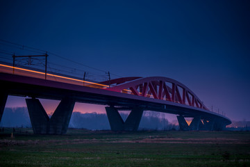 Fototapeta na wymiar Hanzelijn, railway bridge over the ijssel near Zwolle