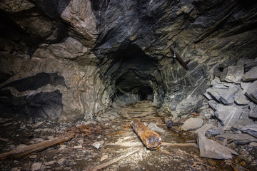 Underground abandoned mica ore mine shaft tunnel gallery passage