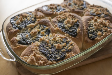 traditional homemade cakes filled with sweet curd cheese and on top are plum jam
