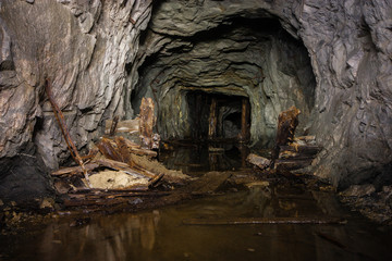 Undeground abandoned old mica ore mine shaft