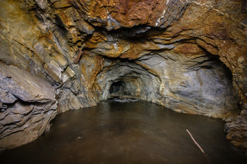 Undeground abandoned old mica ore mine shaft