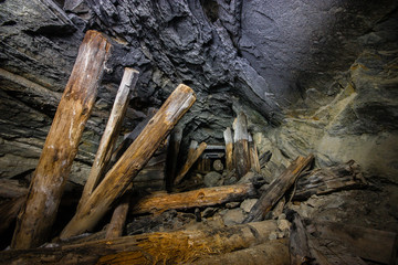 Fototapeta premium Old abandoned underground ore mica mine shaft tunnel
