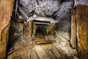 Fototapeta premium Old abandoned underground ore mica mine shaft tunnel