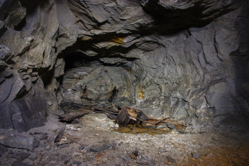 Old abandoned underground ore mica  mine shaft tunnel