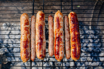 Oktoberfest. Homemade chicken sausages and lamb sausages are roasted on the grill.