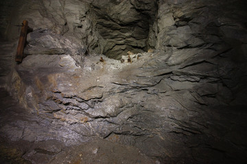 Old abandoned underground ore mica  mine shaft tunnel