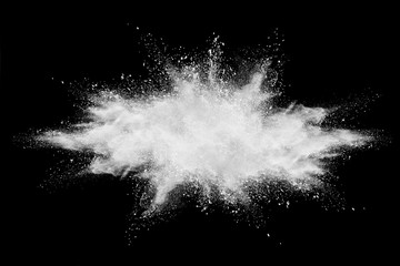 Launched colorful powder, isolated on black background.
