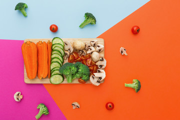 Obraz premium Vegetables on colorful abstract background, healthy food